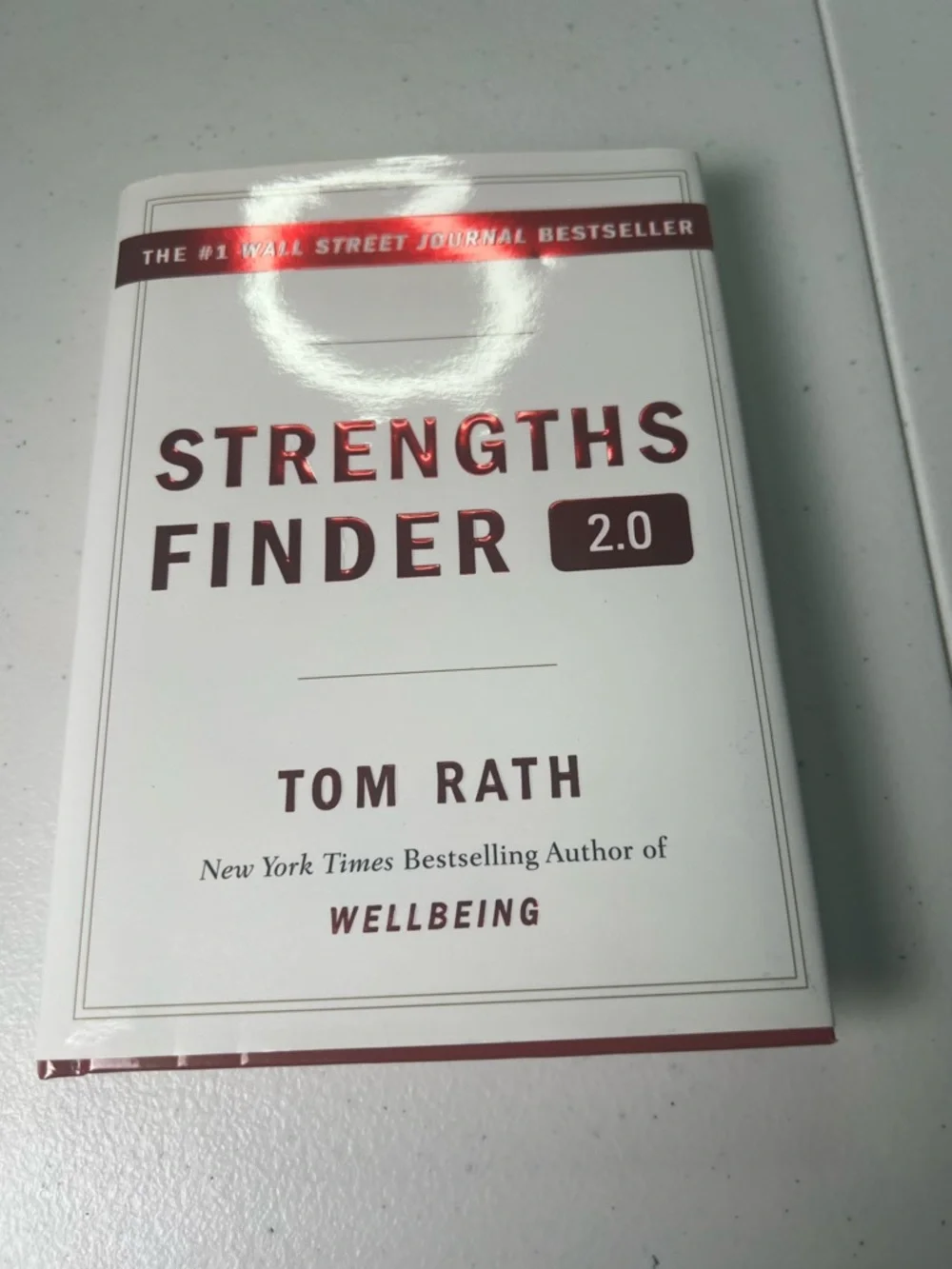 Strengths Finder 2.0 by Tom Rath - White Cover with Maroon Text